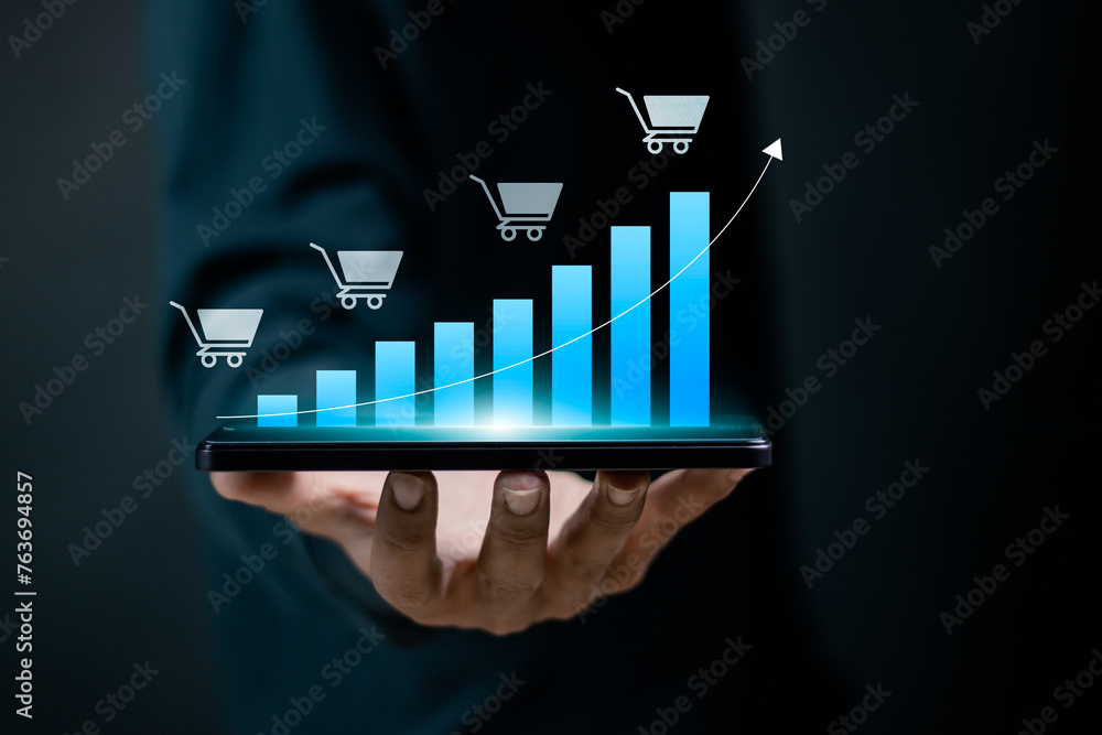 Poster sale growth concept. businessman showing graph of increase in sales volume with shopping cart on vir