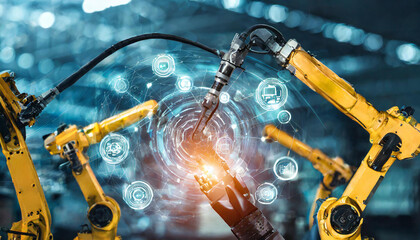 AI Smart industry robot arms for digital factory production technology showing automation manufacturing process of the Industry 4.0 or 4th industrial revolution and IOT software to control operation