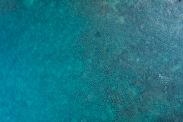 Clear blue sea on the island from above