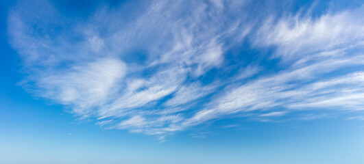 Real day sky - real blue sky during daytime with white light clouds Freedom and peace. Large photo...