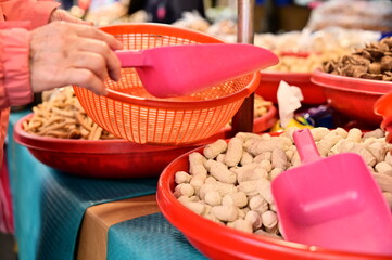 In Taiwan's markets, stalls display a variety of gluten products. Gluten, made from wheat flour,...