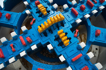 Colorful of cutter head of a Tunnel boring machine (TBM) look like brick building game. Machine for underground drill.