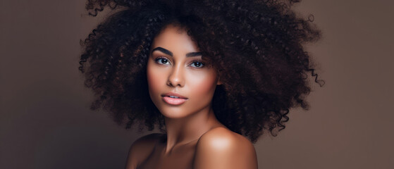 Beautiful wide portrait of delightful black brown american girl model with afro hairstyle and smooth skin 