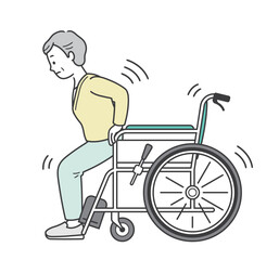 車椅子から立ち上がろうとする高齢女性