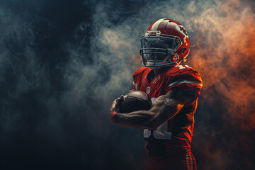 A football player is holding a football in his hands.