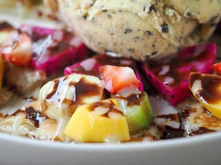 toast with ice cream and fruit topping dish