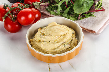 Creamy hummus in the bowl