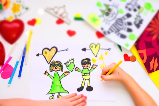 Child drawing hearts, couple , family, funny sketch for birthday, Mothers day or Valentines day. Education. Inspiration and imagination
