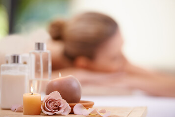 Candle, rose and holistic healing at spa for aromatherapy, wellness and treatment for self care....
