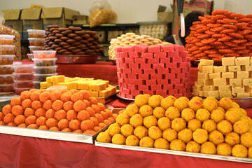Delicious colorful Indian sweets displayed at Batu Cave Temple.Indian traditional diwali sweets called Motichoor Ladoo.