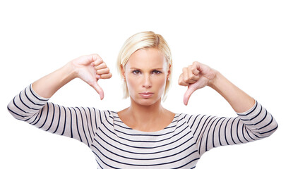 Woman, angry and thumbs down with review in portrait, body language or disagreement with fail on white background. Hand gesture, emoji with rejection or negative feedback, bad results and opinion - obrazy, fototapety, plakaty