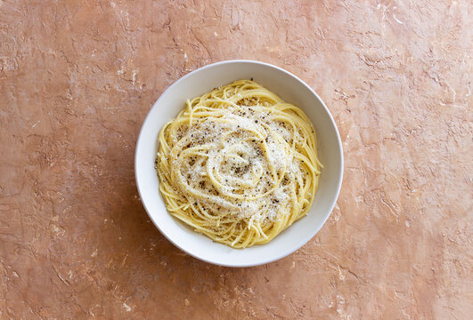 Roman pasta spaghetti with black pepper and cheese. Cacio e pepe. Recipes.