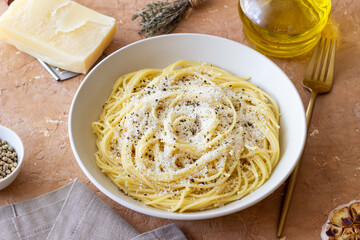 Roman pasta spaghetti with black pepper and cheese. Cacio e pepe. Recipes.