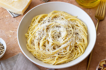 Roman pasta spaghetti with black pepper and cheese. Cacio e pepe. Recipes.