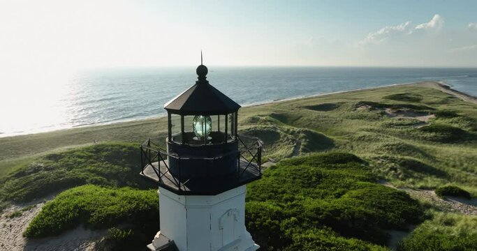 New Shoreham, RI, USA 08-13-2023:  Summer aerial video of the North Light House on Block Island Rhode Island.