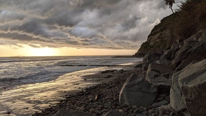 A stormy day sunset - Southern California beach scenes with sunsets, surfers, tide pools and palms...