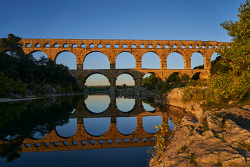 ancient Roman aqueduct Pont du Gard in the Provence, France. - obrazy, fototapety, plakaty