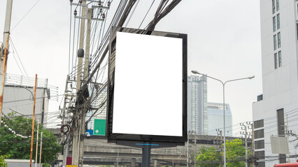 An image of a billboard on a vertical black LED screen in a city. which is just below the level of...