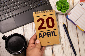 20 april wooden calendar in white background
