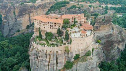 Fototapeta na wymiar Meteora, Kalabaka, Greece. Monastery of Varlaam. Meteora - rocks, up to 600 meters high. There are 6 active Greek Orthodox monasteries listed on the UNESCO list, Aerial View