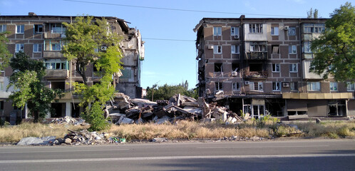 Buildings destroyed during the war in Ukraine in 2022. Destruction of the city during the war. Zone...