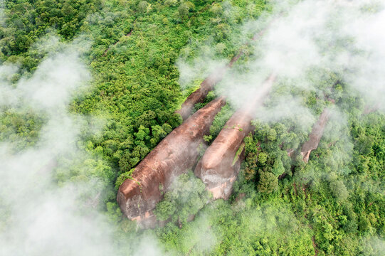 Aerial shot(Drone shot)  of "Hin Sam Wan" ( Three whales Rock) through out the clouds.this is a tourist attraction in Bueng Kan province,Thailand.