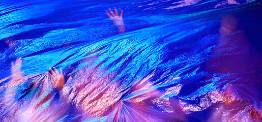 Dancers Performing Behind a Transparent Curtain On Stage Under Blue Light