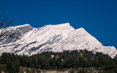 Landscape view of snow covered mountains in Nepal.