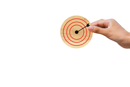 Hand holding dart board and arrow on white background for setup business objective target and goal concept. PNG