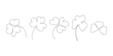 Set of beauty clovers drawn by one line. Floral sketch. Continuous line drawing. Minimalist art for patrick day. Vector illustration.