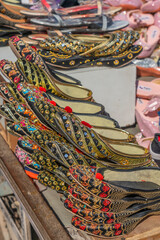 Traditional Rajasthan shoes at the street in Jodhpur, India.