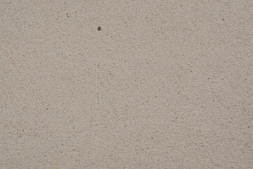 Recycled beige cardboard close up texture. Old paper background.