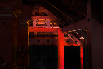 Red column and beam at a temple in Nakhon Sawan Province.