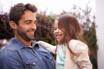 Fototapeta premium Family, smile and father carry girl for bonding, outside and fun for quality time. Laugh, parent and young daughter with love in nature, embrace and happiness for vacation or travel with dad