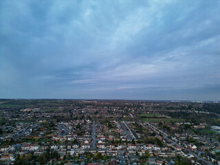 Aerial View of Residential Homes During Orange Sunset over England UK