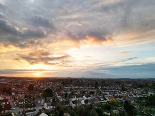 Aerial View of Residential Homes During Orange Sunset over England UK
