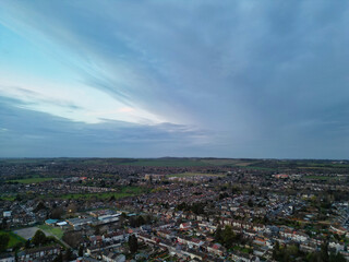 Aerial View of Residential Homes During Orange Sunset over England UK