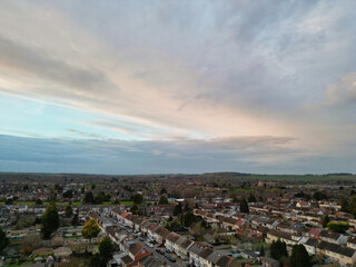 Aerial View of Residential Homes During Orange Sunset over England UK