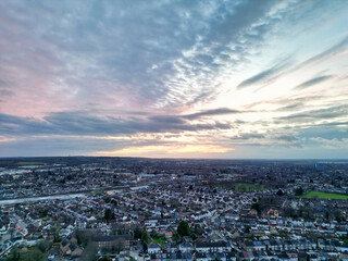 Aerial View of Residential Homes During Orange Sunset over England UK