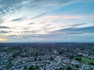 Aerial View of Residential Homes During Orange Sunset over England UK