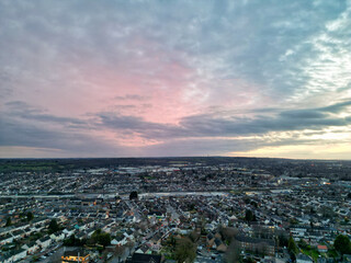 Aerial View of Residential Homes During Orange Sunset over England UK