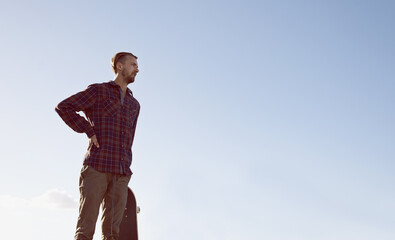 Skateboard, thinking and man at a skate park with idea for trick, stunt or adrenaline sports on...