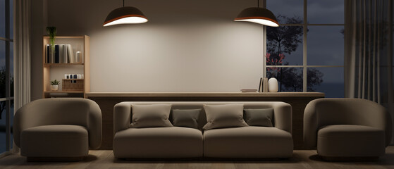 Interior design of a contemporary living room at night features a comfortable couch and armchairs.