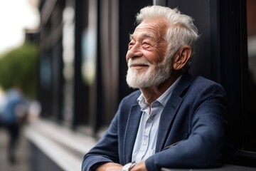 shot of a senior man sitting outside and enjoying the day - obrazy, fototapety, plakaty