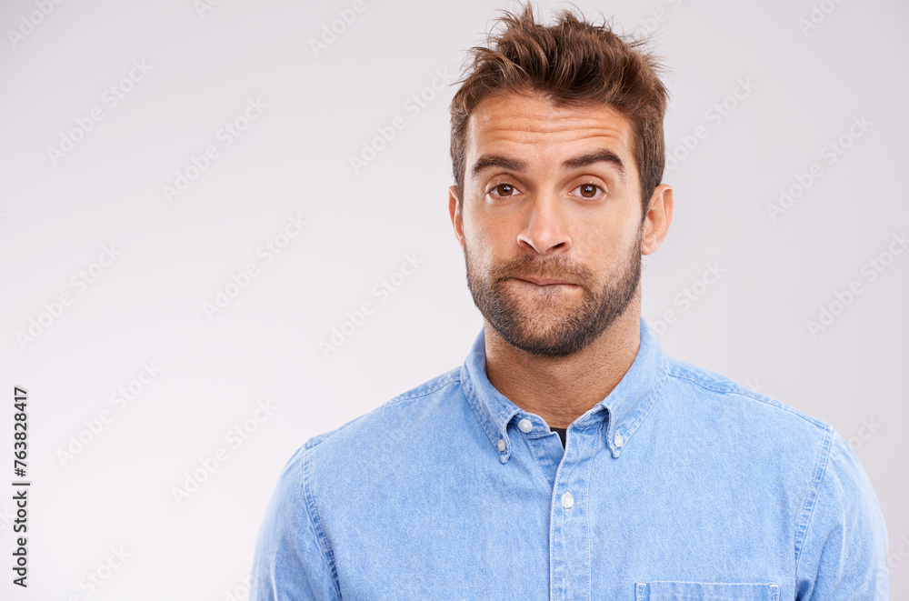 Poster studio, portrait and man with doubt, worry and confused on white background with mockup space. opini