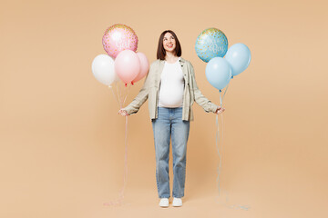 Full body fun young pregnant woman future mom wear grey shirt with belly stomach tummy with baby...