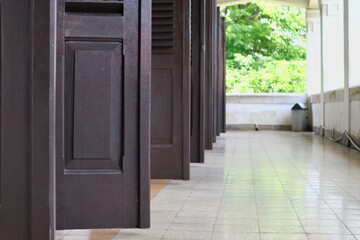Detail exterior of the row doors on the hallway at the Historical building of Lawang Sewu, Old...
