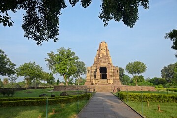 Beautiful temple adorned with sculptures and surrounded by peaceful nature., Duladeo Shiva Temple - Khajuraho - Madhya Pradesh - India