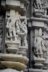 Elaborate and precise carvings in sculptures are intricate works of art created from a diverse range of materials, showcasing enchanting shapes and textures at khajuraho group of monuments, India