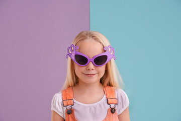 Girl, child and sunglasses with fashion for style, funky clothes and colour block background....